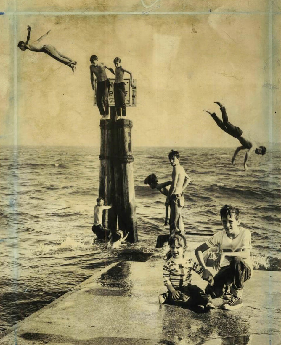 Summer-Like Day In 1976: Kids Diving Off A Staten Island Pier, Location Unknown, 1976.