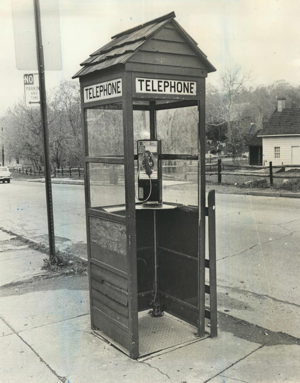 Log Cabin Telephone Booth At Richmondtown Restoration Is Consistent With The Theme Of The Area, 1978.