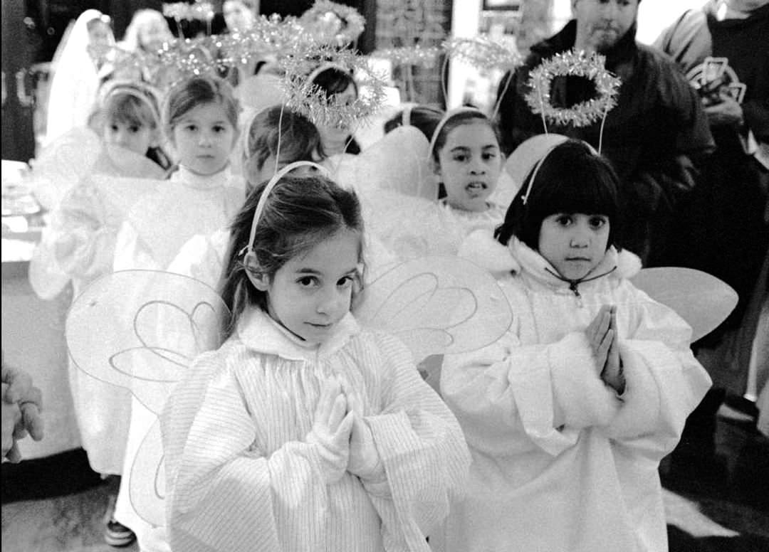 Little Angels March Into St. Thomas R.c. Church, Pleasant Plains, For Mass And A Live-Animal Christmas Stable, 1997.
