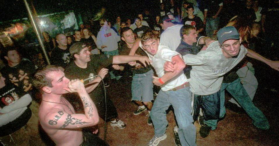 Scene From The Wave, Stapleton, With Resin Lead Singer Angelo Palermo Jumping Into The Mosh Pit, Capturing The Energy Of The Local Music Scene, Circa 1999.