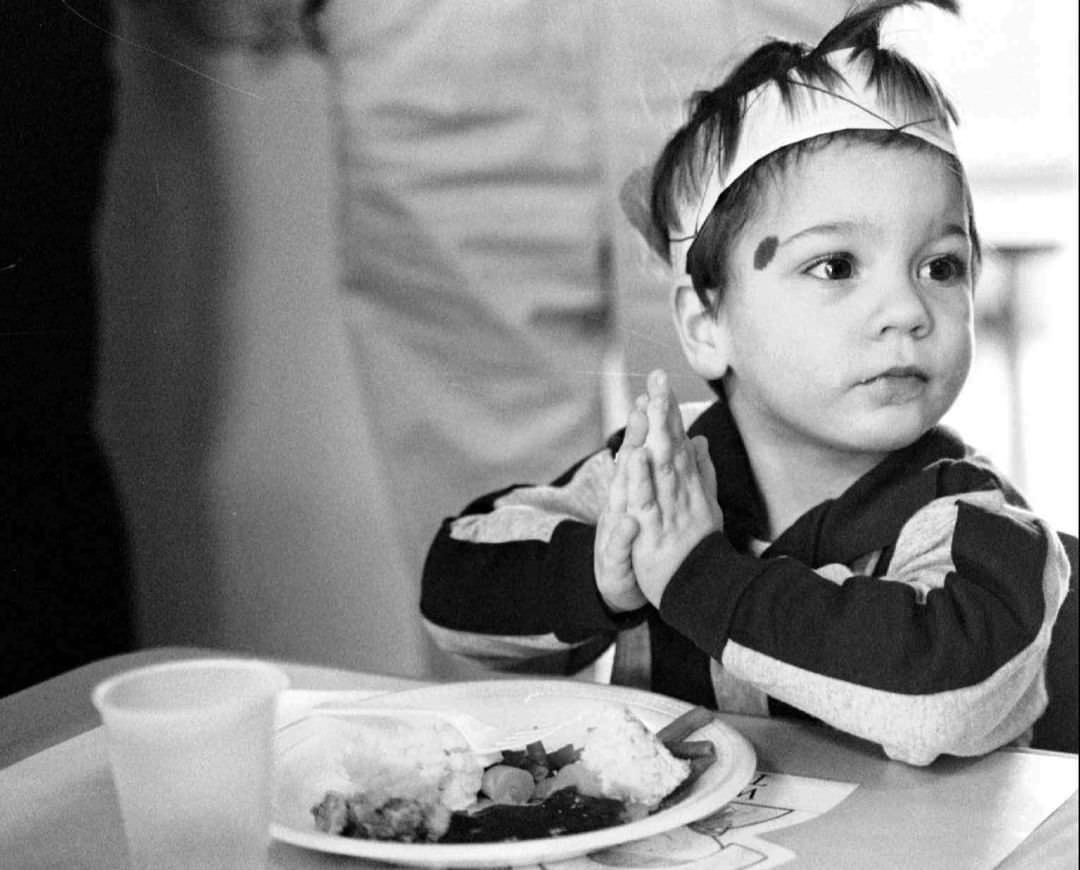 Russell Alverson Saying His Thanksgiving Prayer At Tender Care Preschool, Staten Island, 1997.