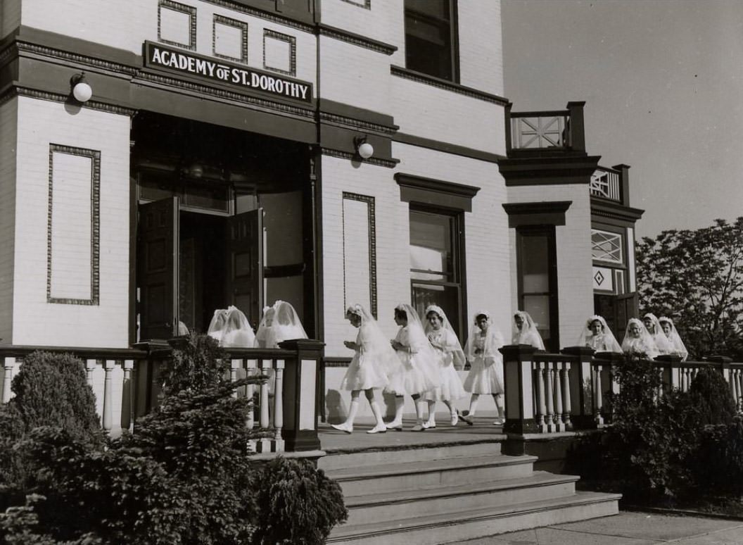 First Communion Class From The 1950S Marching Into The School Building, 1950S.