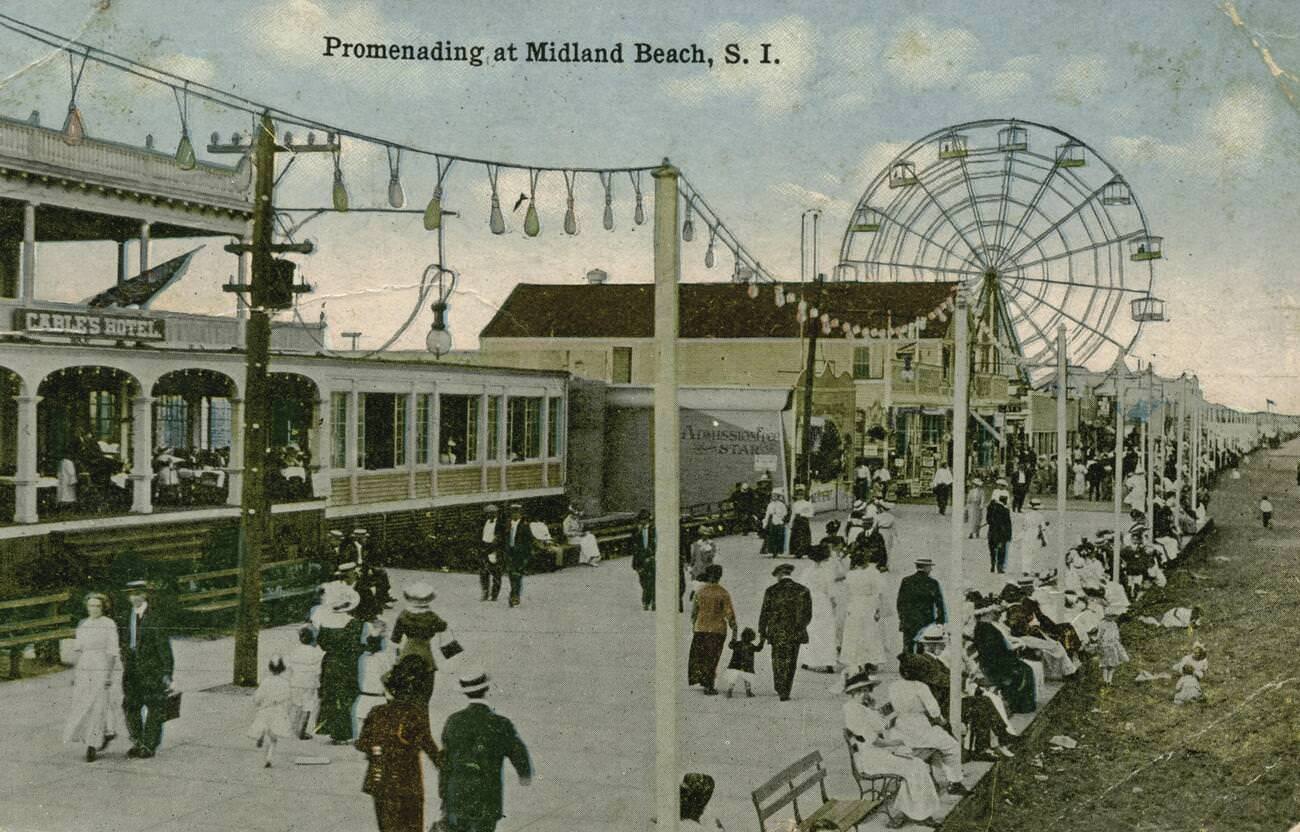 People Enjoying Midland Beach Boardwalk, Featuring Cable'S Hotel And A Ferris Wheel In The Background, Staten Island, 1900.