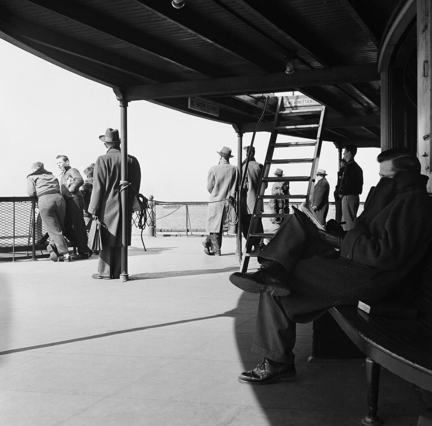 Passengers Enjoy The Outdoor Deck During A Trip On The Staten Island Ferry, 1948.