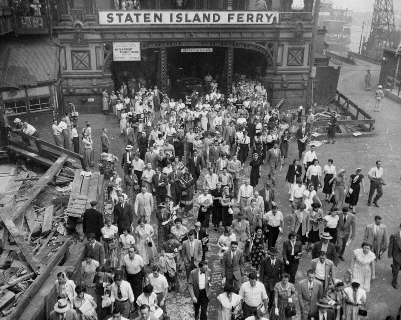 Commuters Pour Out Of The Staten Island Ferry Terminal At Battery Park, En Route To Manhattan, September 3.