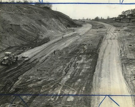Uphill Job, Scraper Moves Up Incline In Staten Island Expressway Bed, Working To Complete Highway, 1964.