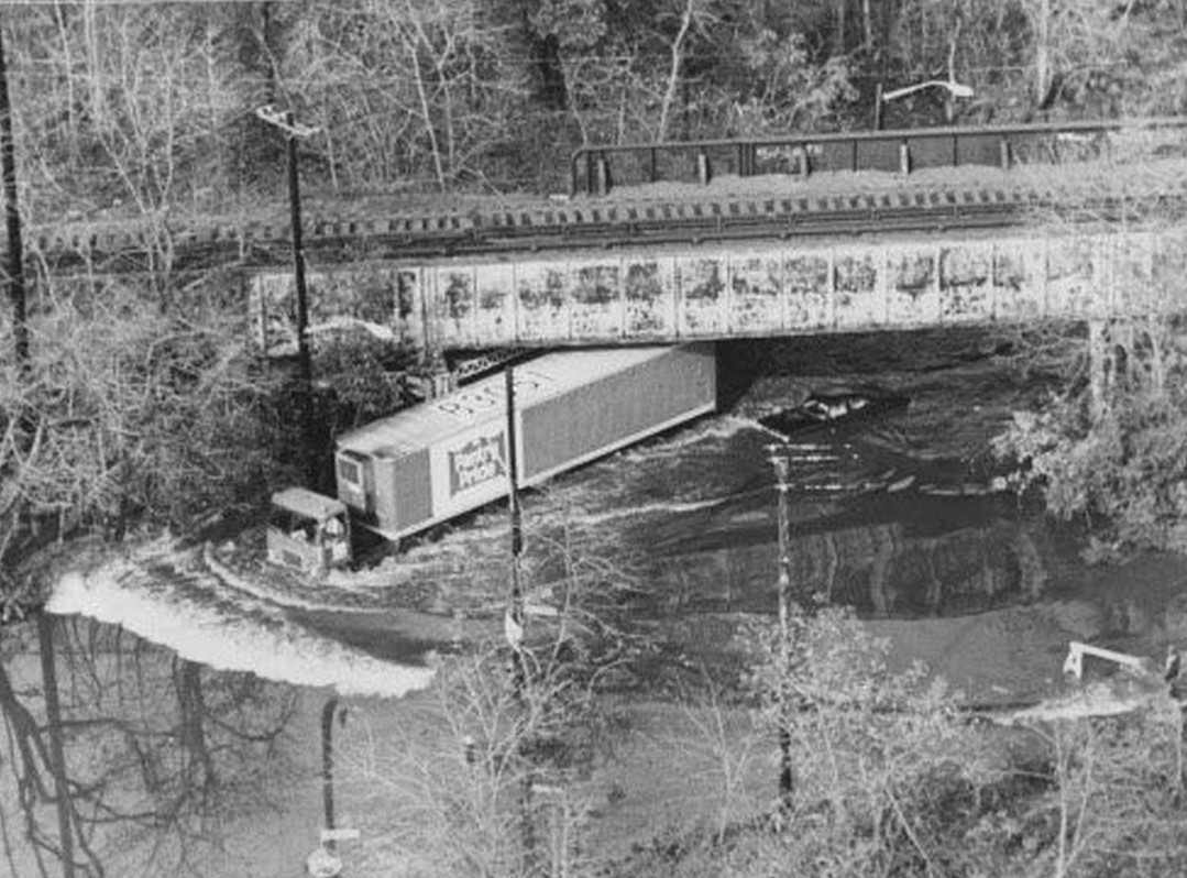 This Tractor-Trailer Manages To Make It Under The Sir Overpass On Amboy Road, But The Auto At Its Rear Wasn'T So Lucky, 1976.
