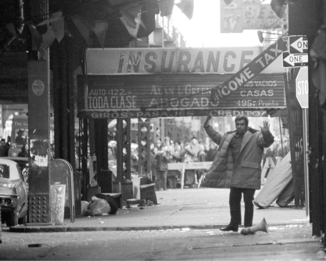 Jerry Riccio Holds Walkie-Talkie Outside Brooklyn Siege Scene, 1973