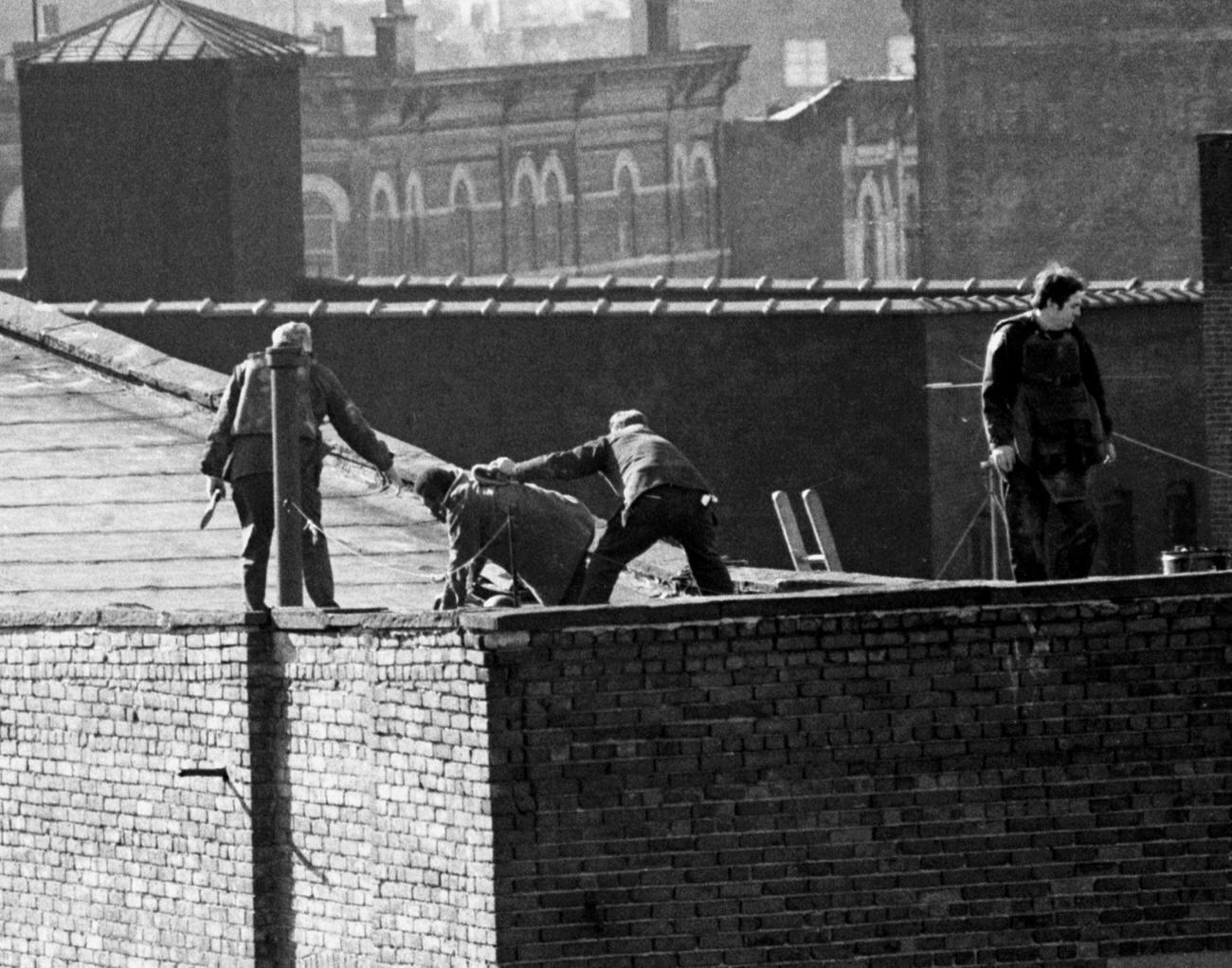 Hostage Assisted By Patrolman To Roof During Brooklyn Siege, 1973