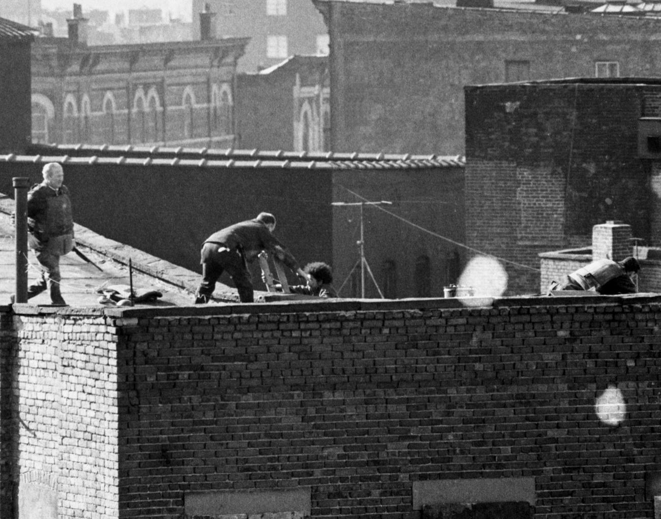 Hostage Runs Across Roof During Brooklyn Siege, 1973