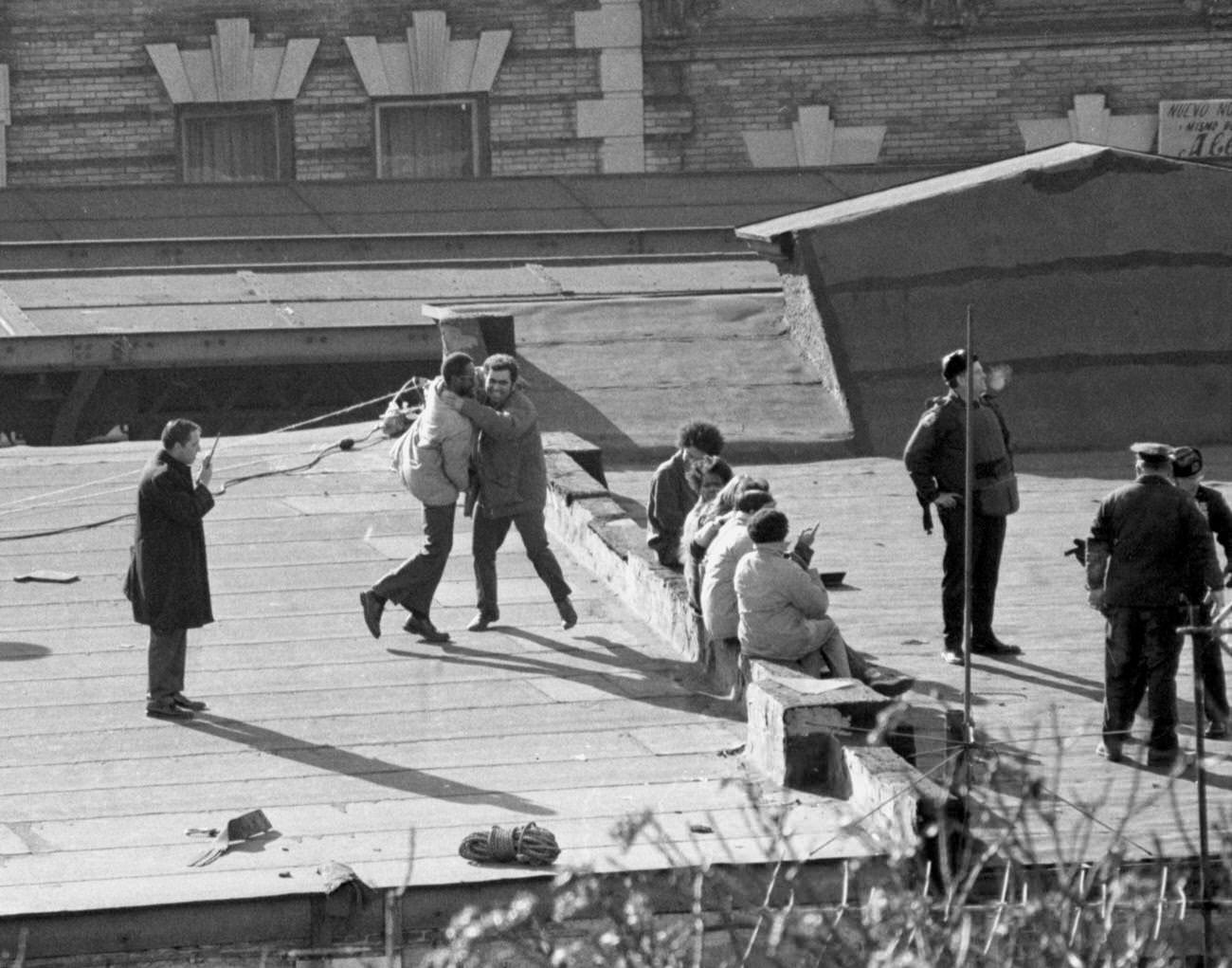 Patrolman Assists Hostage On Roof During Brooklyn Siege, 1973