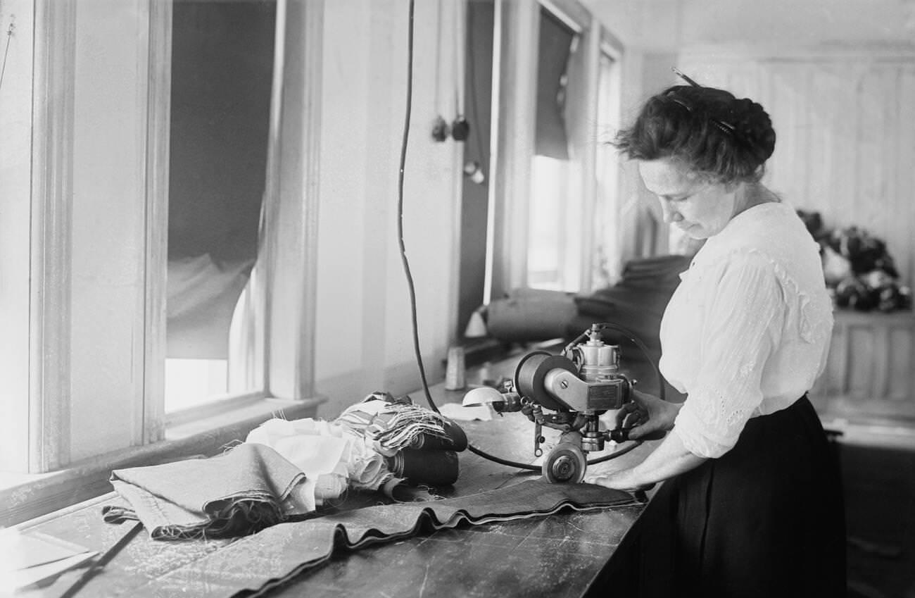 Woman Cutting Stripes For American Flags At Brooklyn Navy Yard, Brooklyn, 1917.