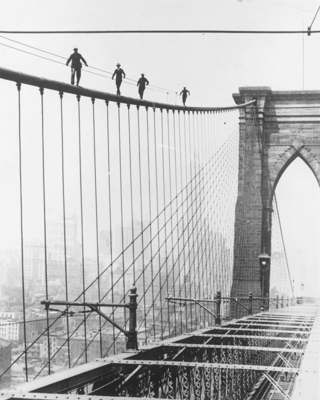 Men Climbing Brooklyn Bridge For A Painting Test, 1925