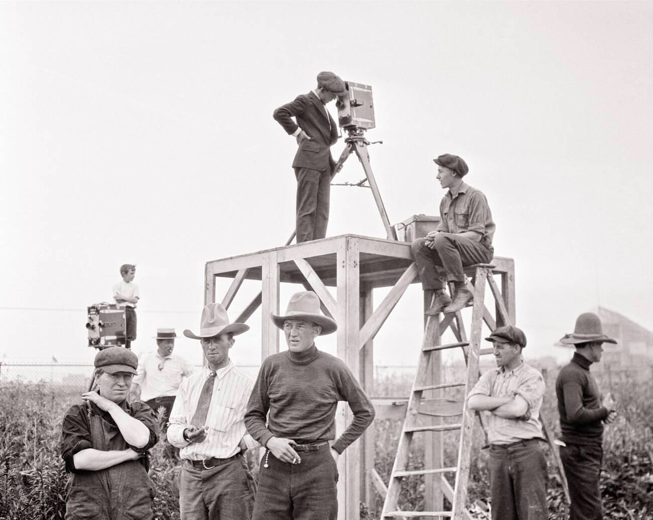 Filming An Auto Race At Sheepshead Bay With Cameramen On Platforms And Cowboys Watching, Brooklyn, 1920S