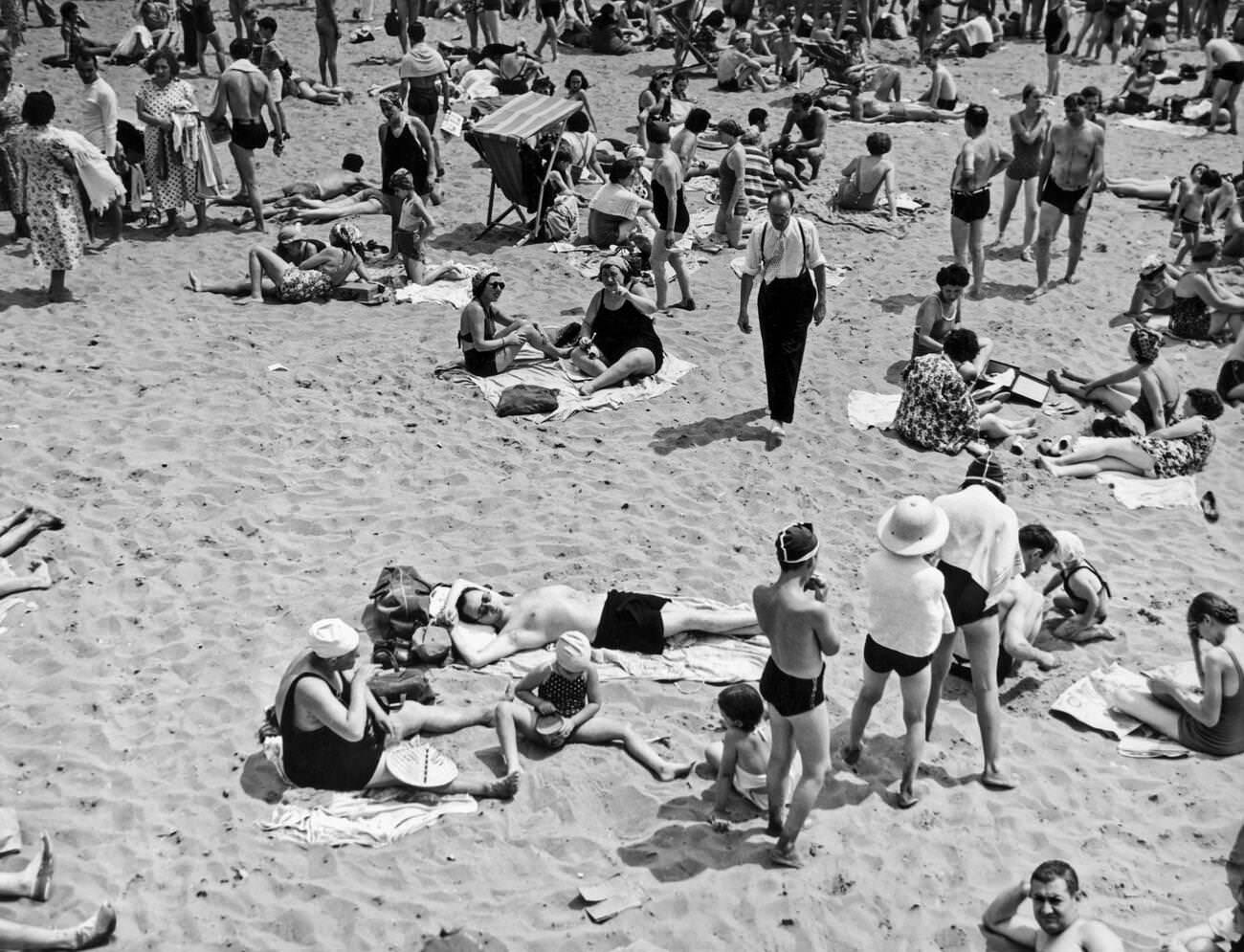 Bathers On The Sands At Coney Island, Brooklyn, July 1938