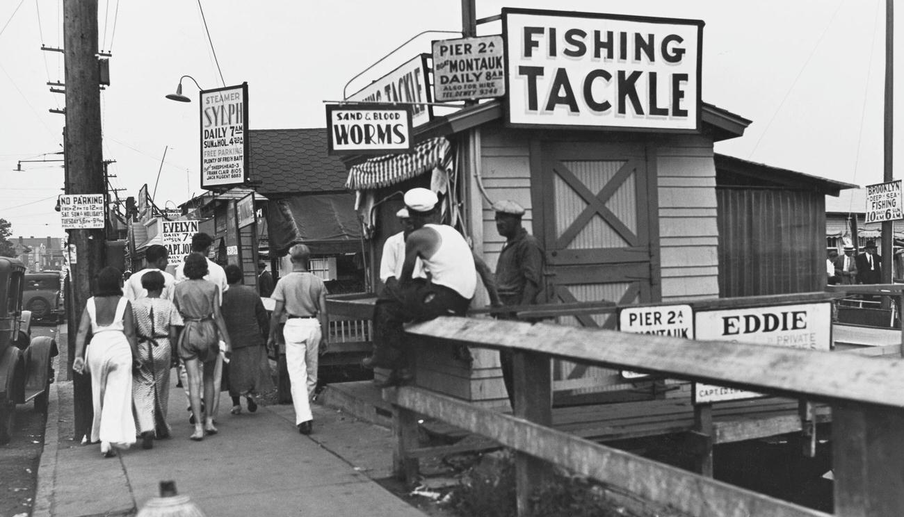 People Outside A Fishing Tackle Shop On Emmons Avenue In Sheepshead Bay, Brooklyn, Circa 1935.