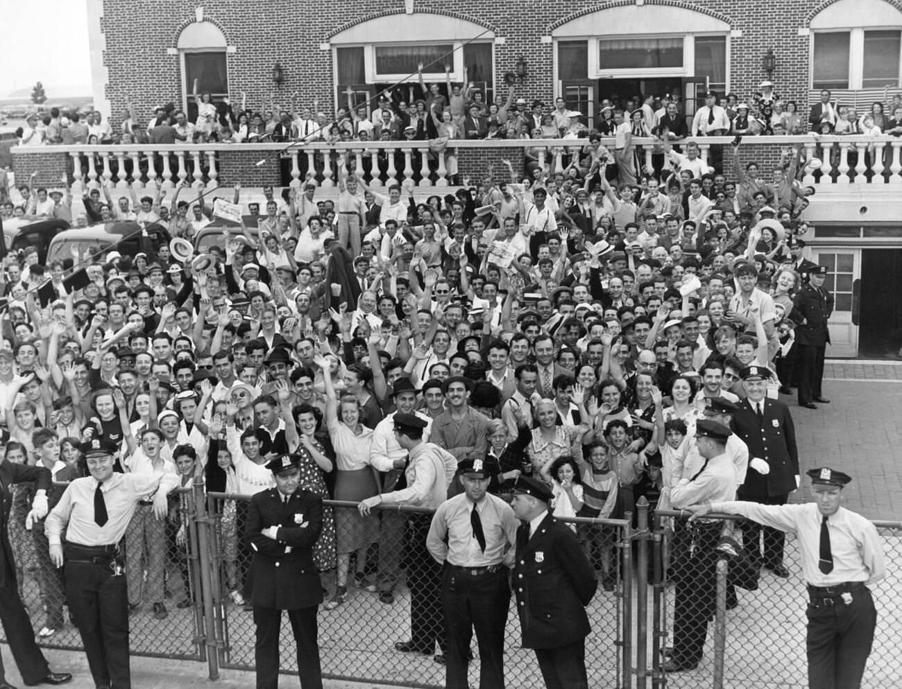 Crowd At Bennett Field In Brooklyn Welcomes Howard Hughes, 14Th July 1938.