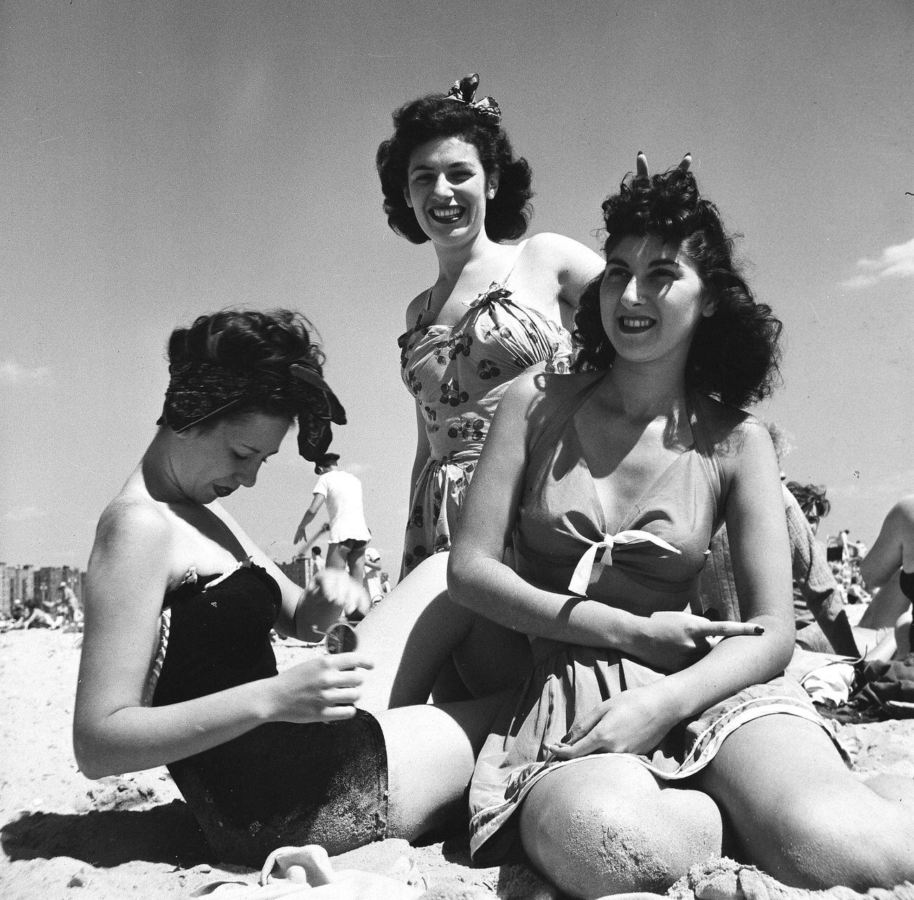 Portrait Of Three Young Women Sitting On Coney Island Beach, 1944
