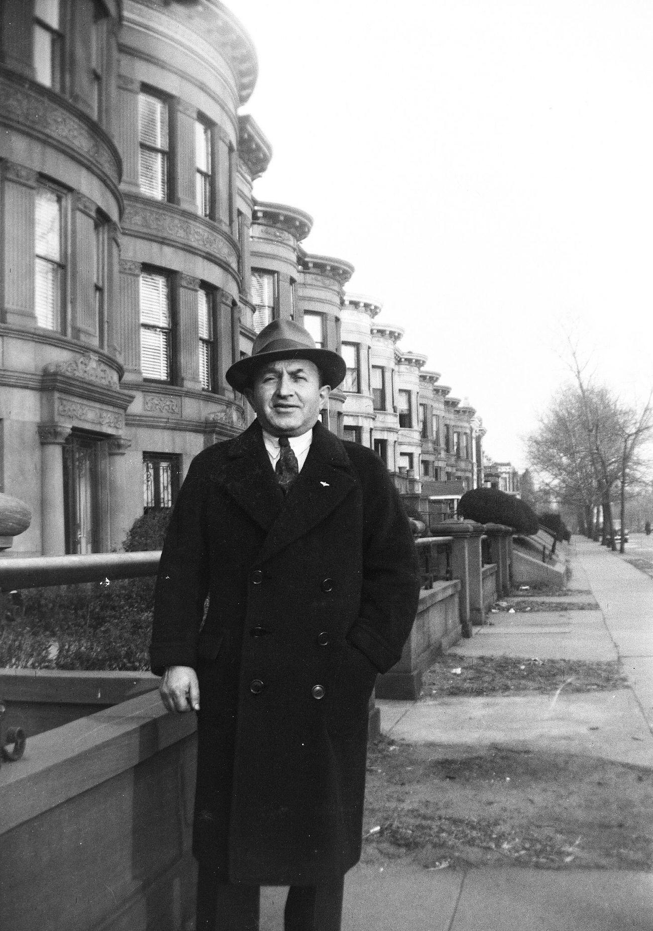 Portrait Of Adolf Schlussel Wearing Winter Coat And Hat On Brooklyn Street, 1944