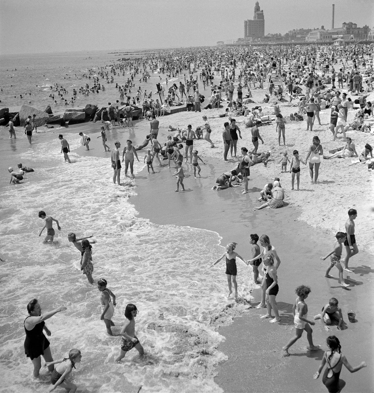 Beachgoers Enjoy Sun At Coney Island, Brooklyn, 1946.