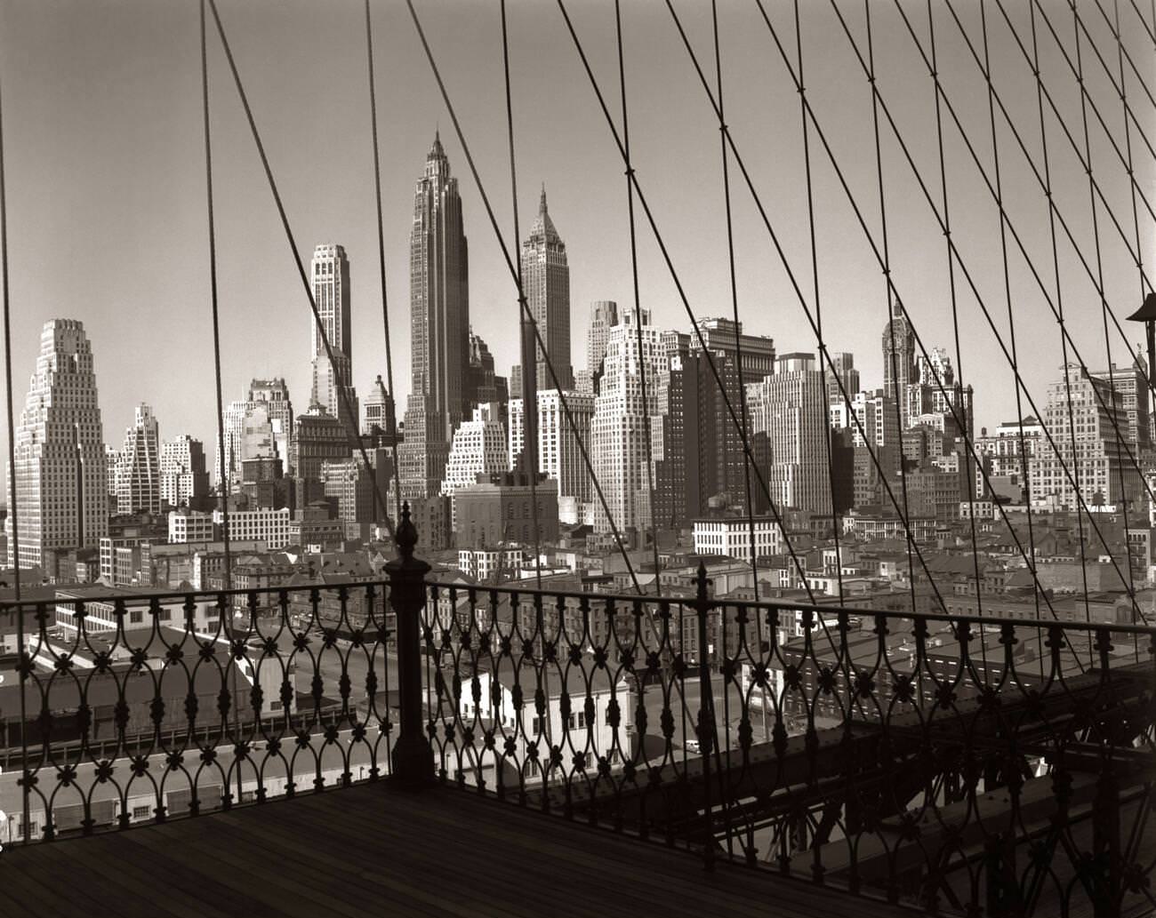 Skyline Of Lower Manhattan Viewed Through Brooklyn Bridge Cables, 1950S.