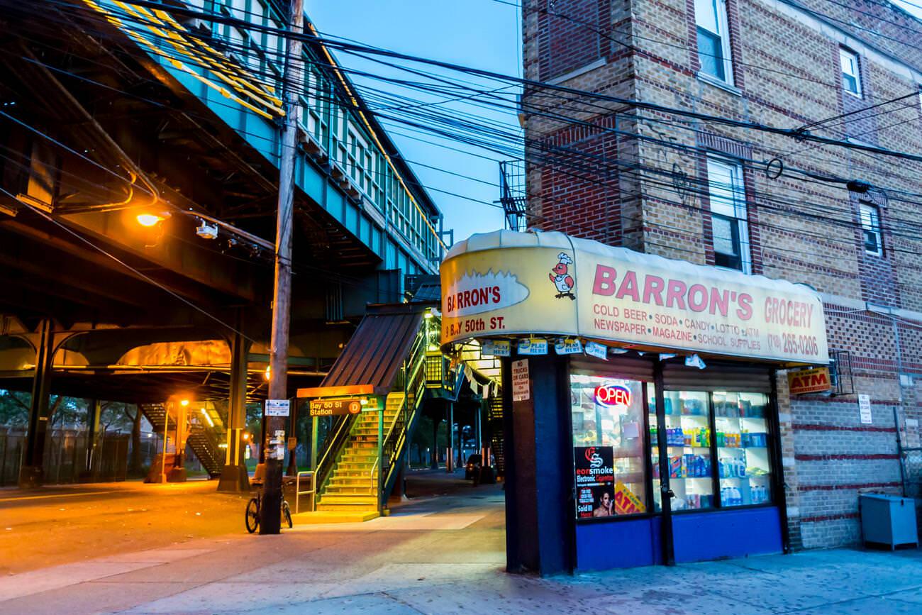 Vintage Grocery Store Barron'S In Brooklyn, With Subway Overpass At Night, 1950S.
