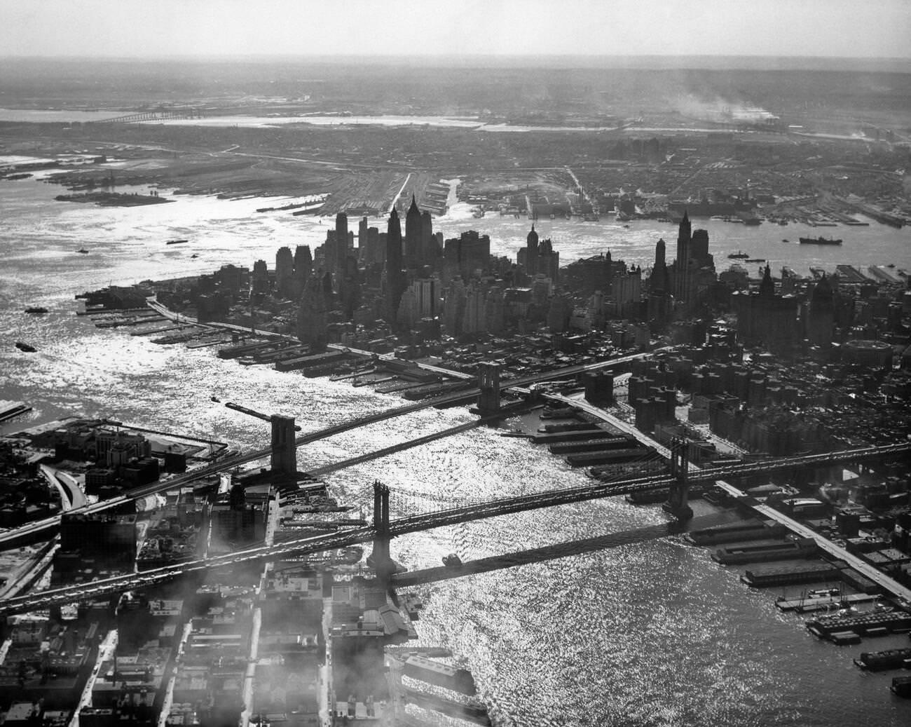 Aerial View Where East And Hudson Rivers Meet, Featuring Brooklyn And Manhattan Bridges, 1950S.