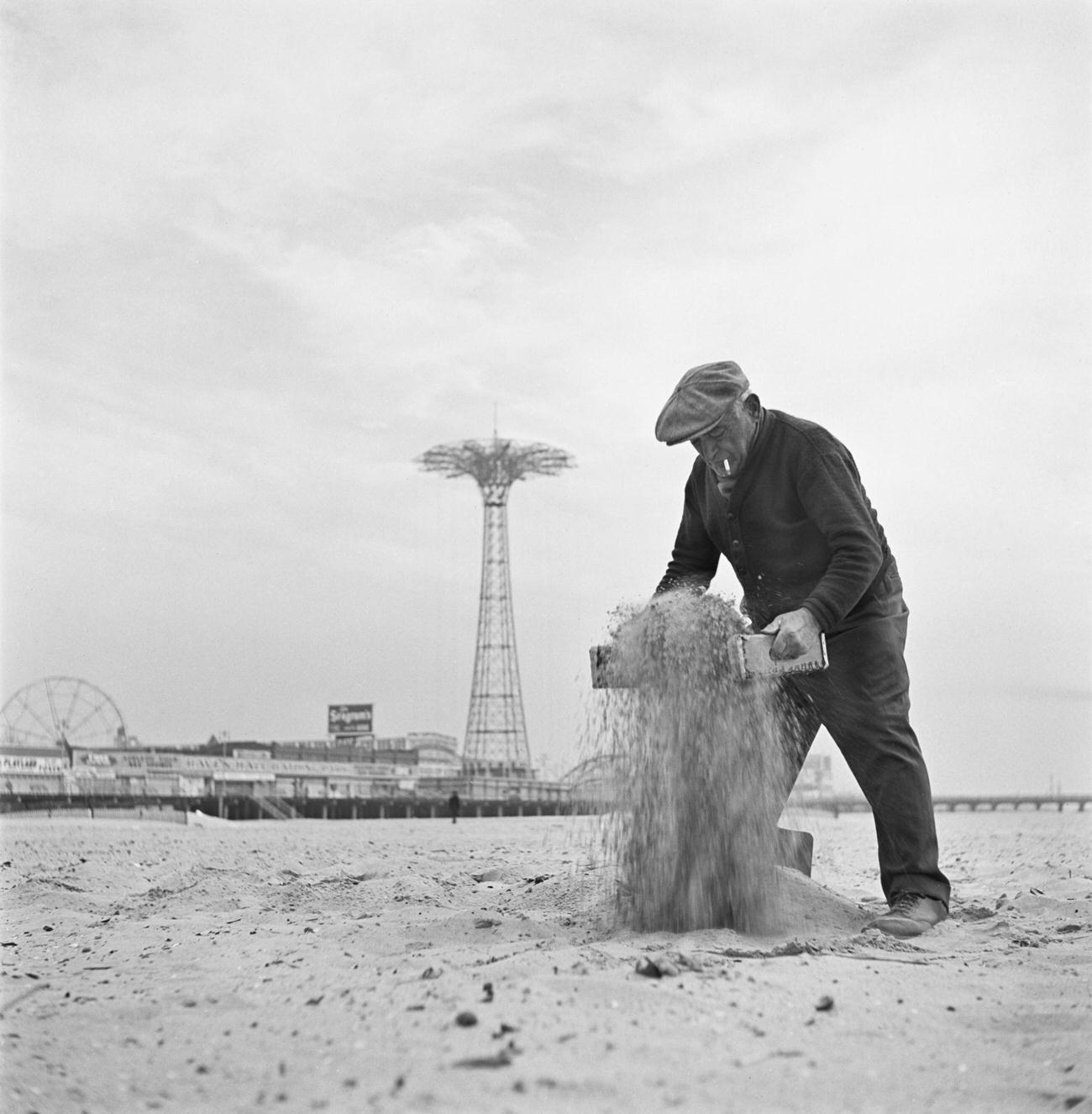 Beachcomber Searching For Valuables On Coney Island Beach, Brooklyn, 1950.