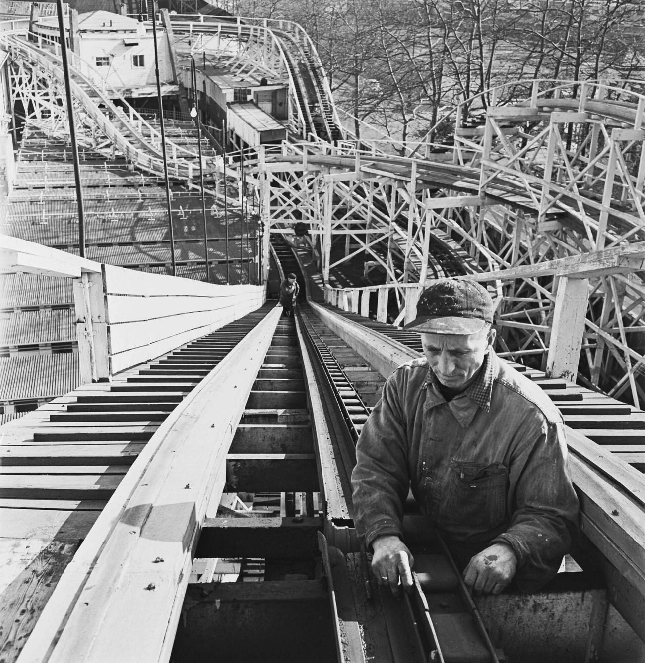 Labourer Working On Rollercoaster Chain Lift At Coney Island, Brooklyn, 1950.