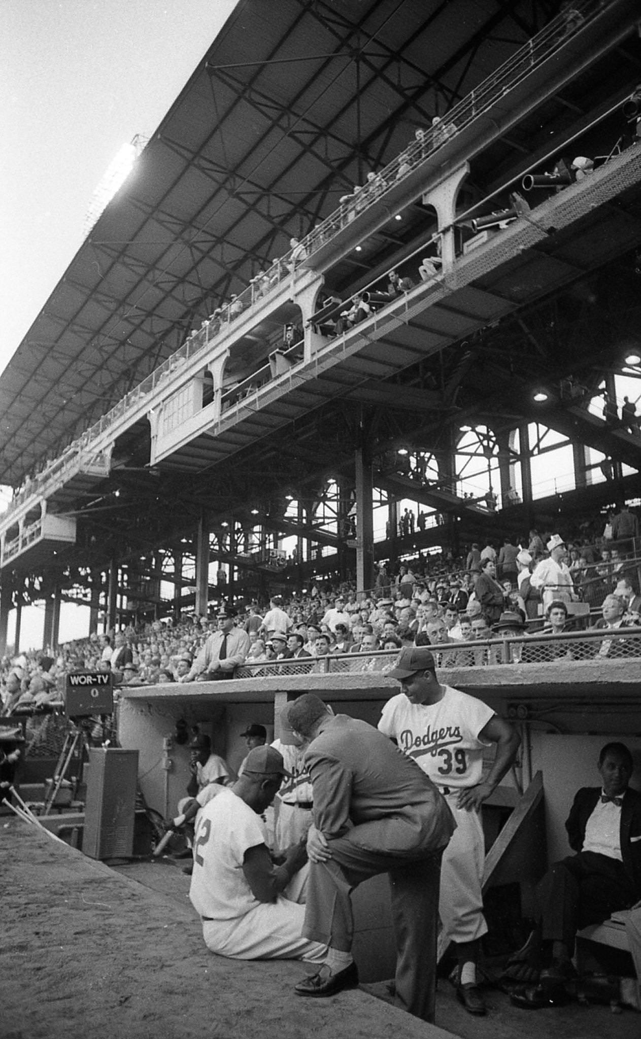Jackie Robinson In The Dugout Vs St. Louis Cardinals At Ebbets Field, Brooklyn, 1956.