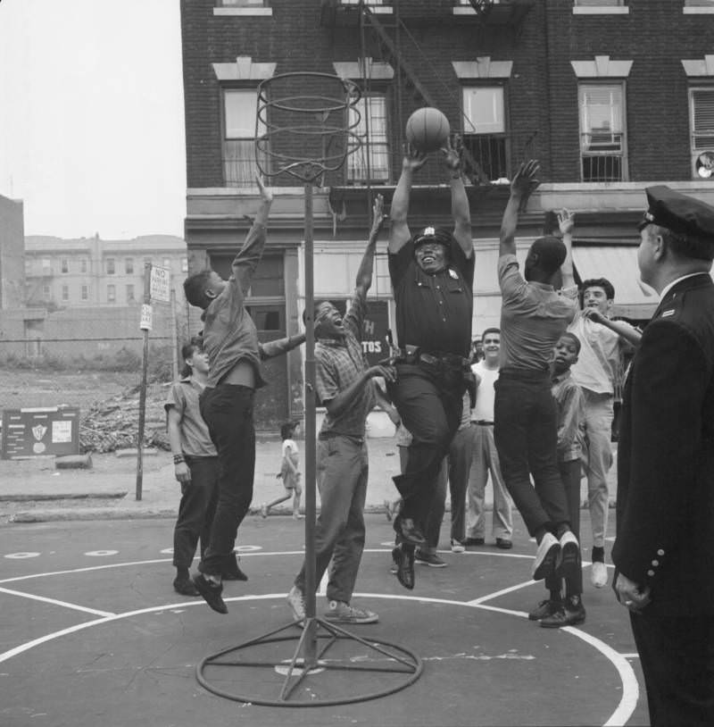 Patrolman Plays Basketball With Local Kids, 1962