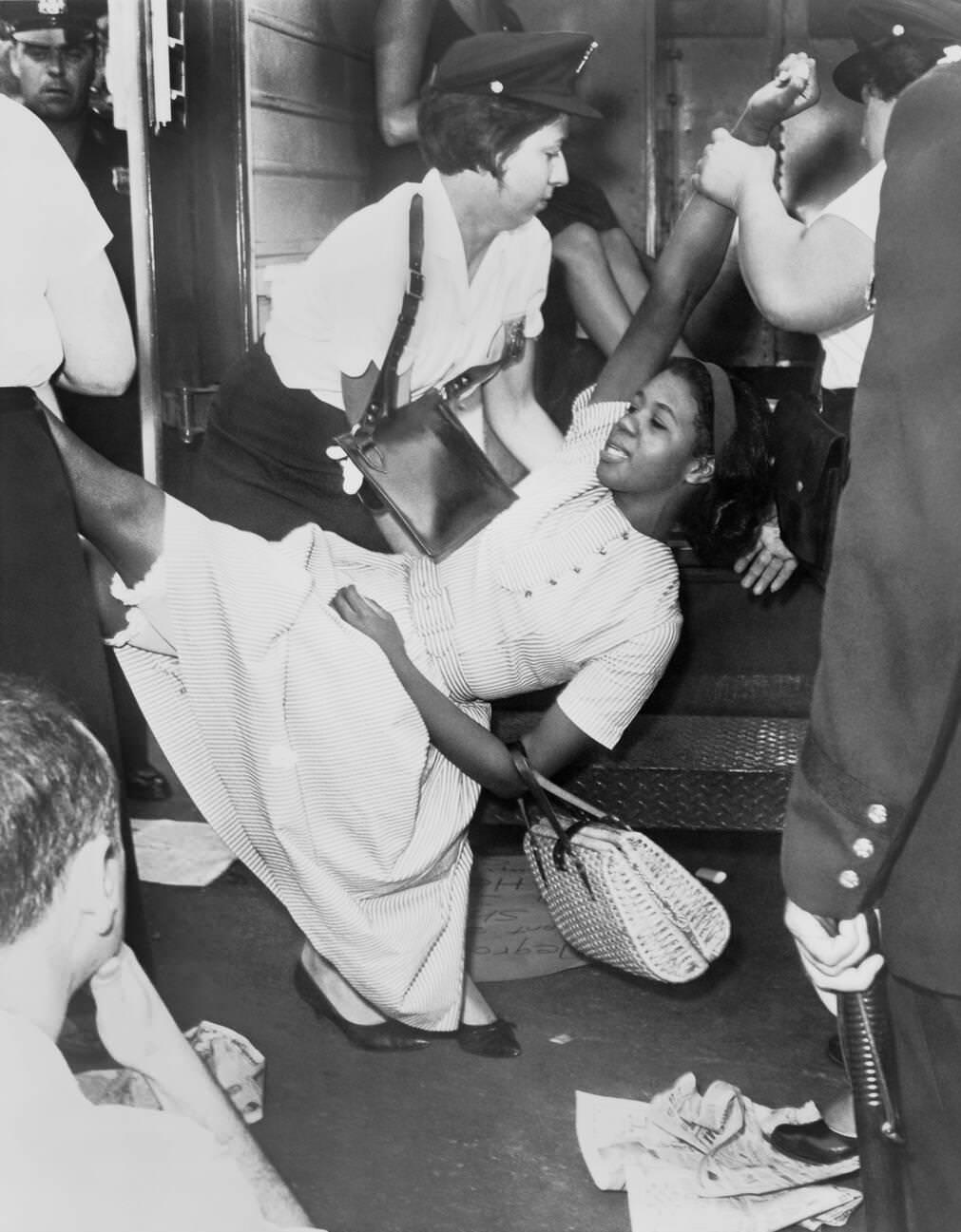 African American Woman Carried To Police Patrol Wagon During A Demonstration In Brooklyn, 1963.