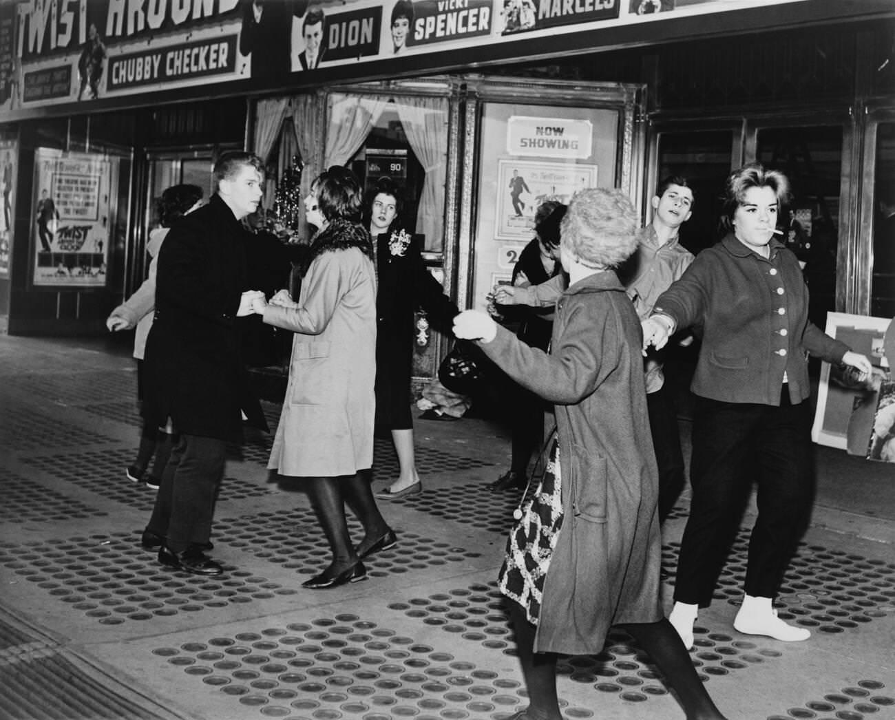 Teens Dance The 'Twist' Outside The Brooklyn Fox Theatre, 1961.