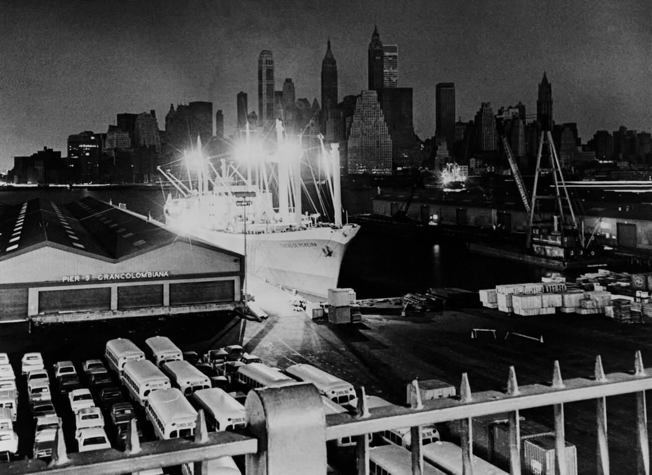 Manhattan'S Skyline In Darkness, Offset By Lights At A Brooklyn Pier, November 9, 1965.