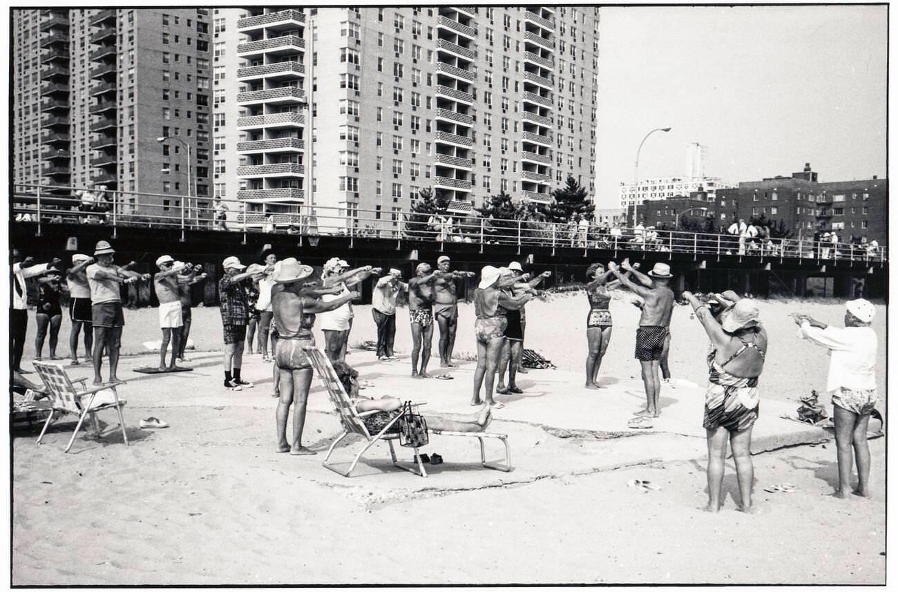 Senior Citizens Exercise On The Sand In Brighton Beach, Brooklyn, Summer 1977.