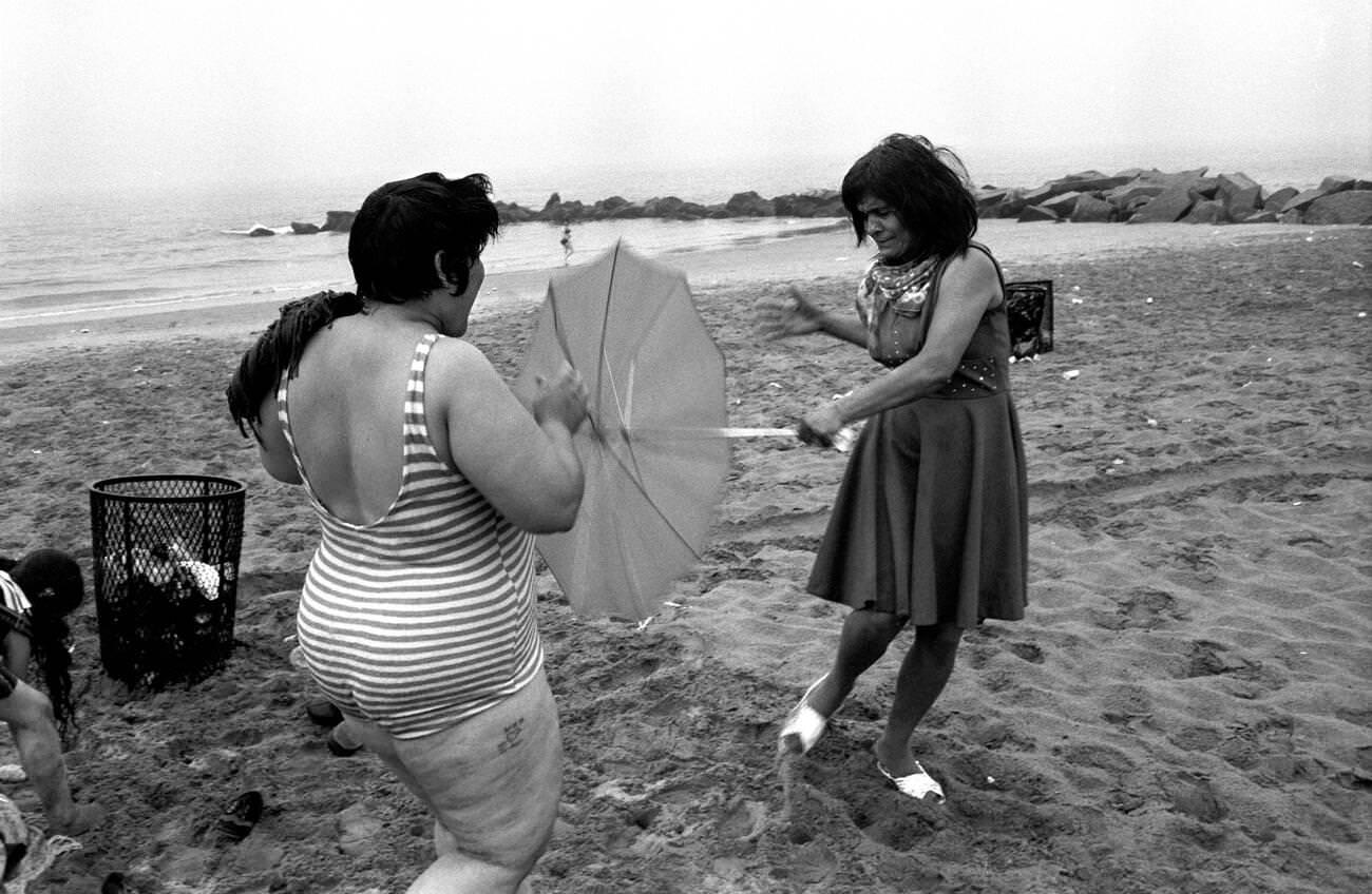 Two Women On The Beach At Coney Island, Brooklyn, 1973.