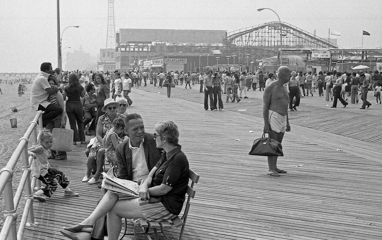 Crowded Coney Island Boardwalk With Partial View Of 'Tornado,' Brooklyn, 1973