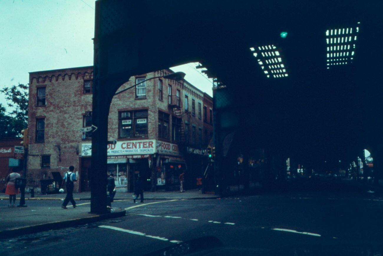 Corner Store Under Elevated Train Tracks At Bushwick Avenue, Brooklyn, 1974