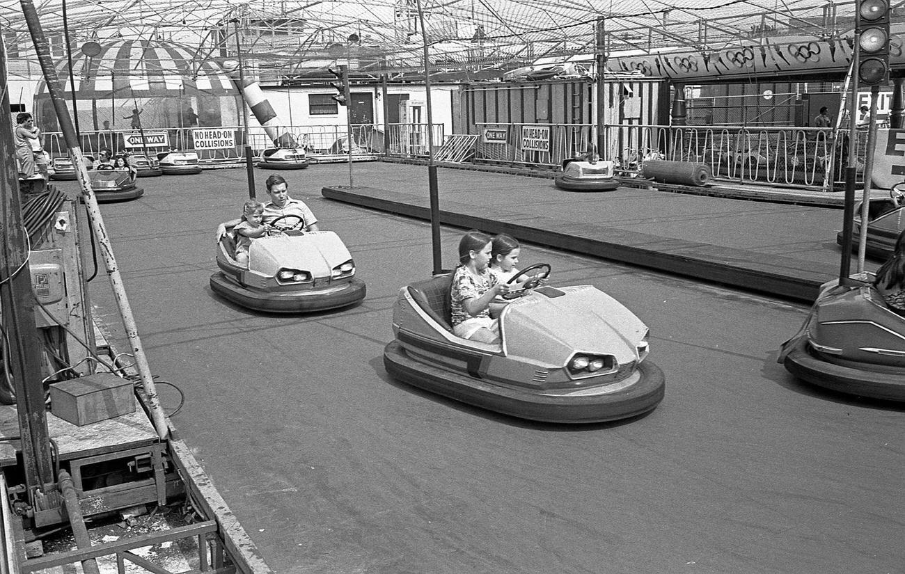 People Driving Bumper Cars At Coney Island'S Astroland Park, Brooklyn, 1974