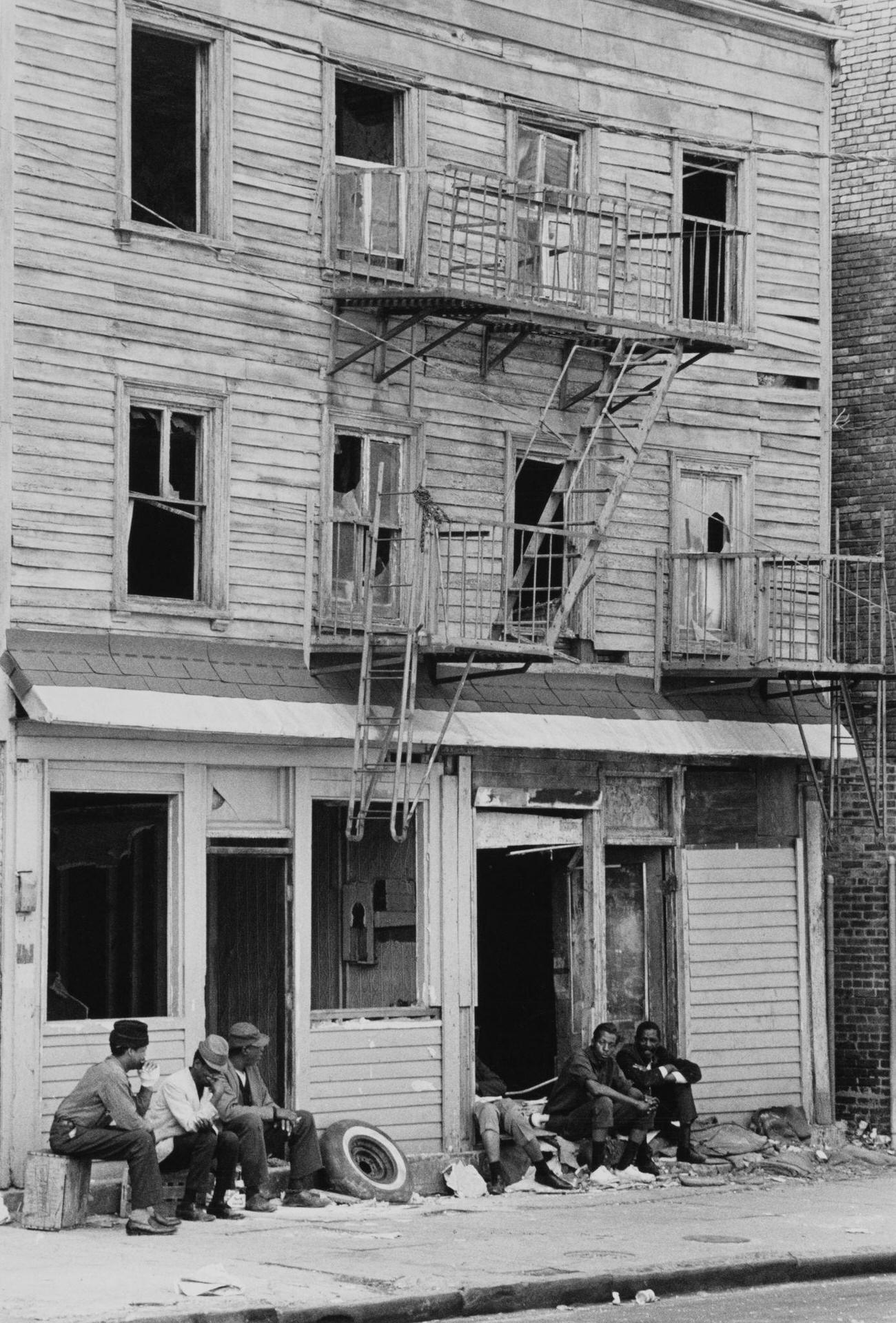 Men Outside A Rundown Property In Brooklyn, 1975.