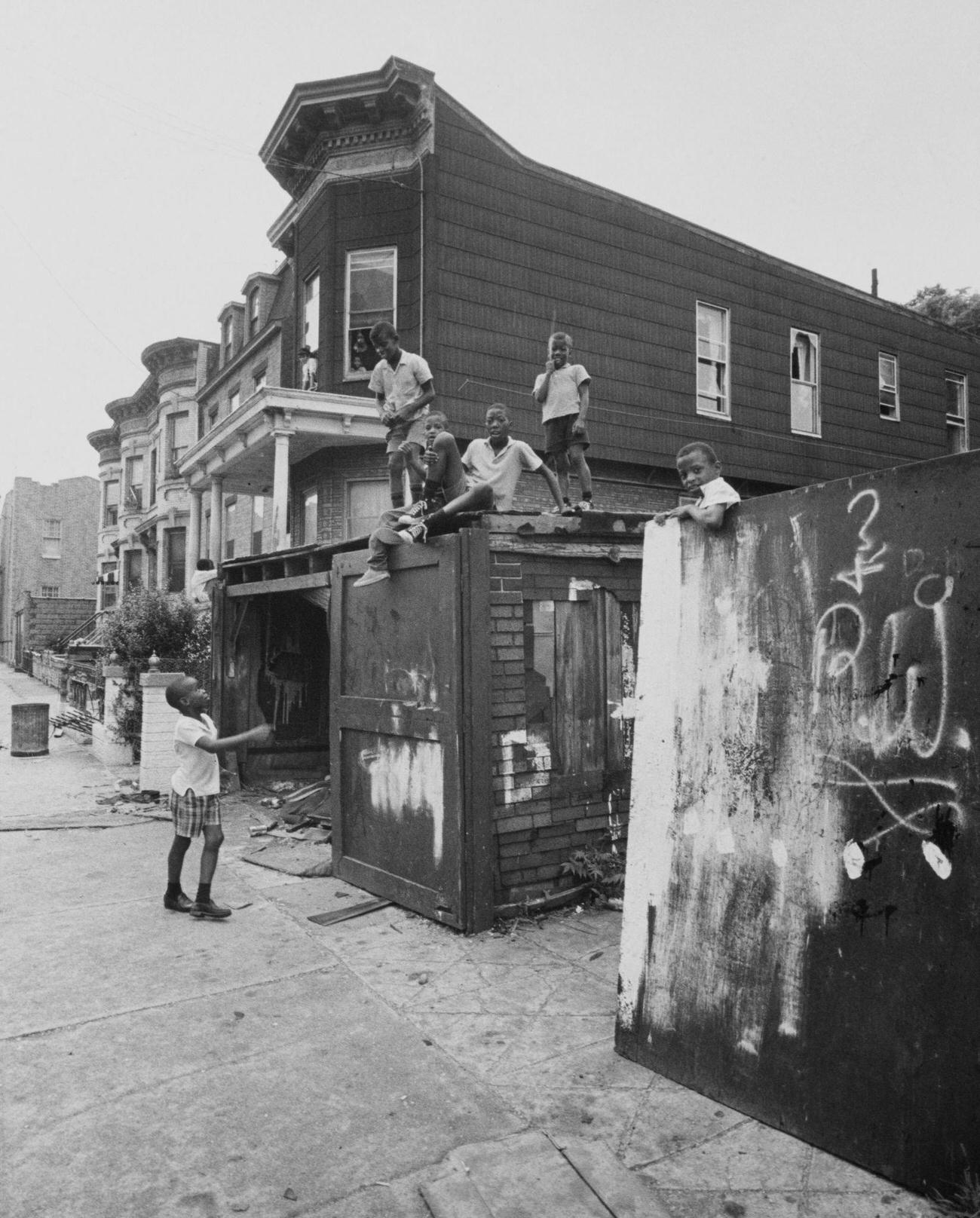 Children On Derelict Garage In Bedford-Stuyvesant, Brooklyn, 1975.