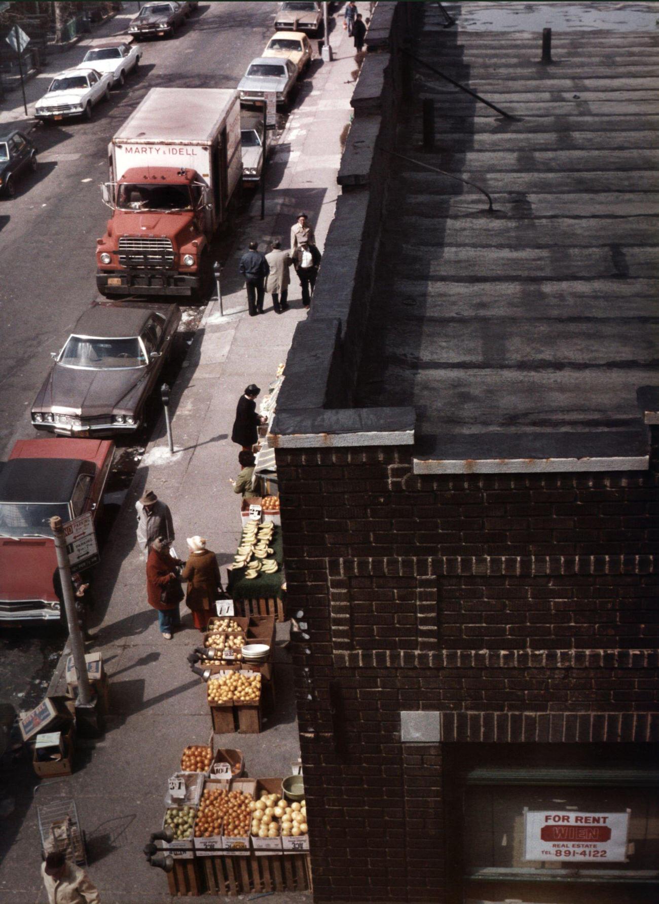 Elevated View Along A City Street In Brighton Beach With Pedestrians And Shoppers, Brooklyn, 1979