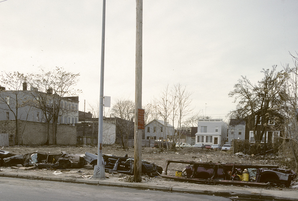 Fence Made Of Flattened Cars In East New York, Brooklyn, 1988.