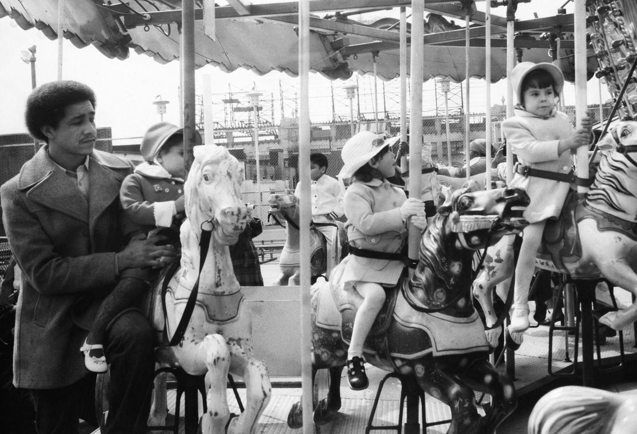 Children Ride Carousel At Coney Island, Brooklyn, 1982