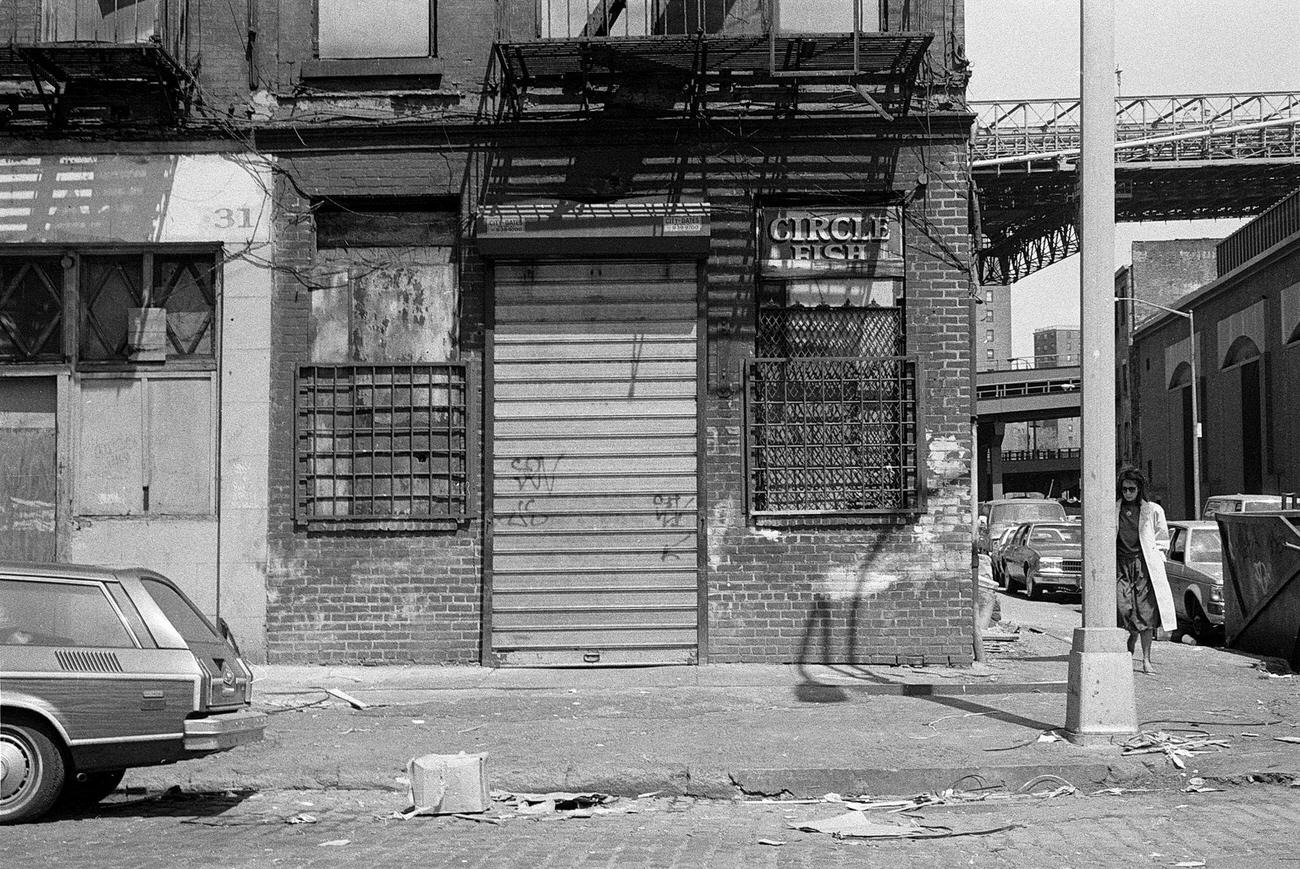 Defunct Circle Fish Monger Shop With A View Of The Manhattan Bridge, Brooklyn, 1983.