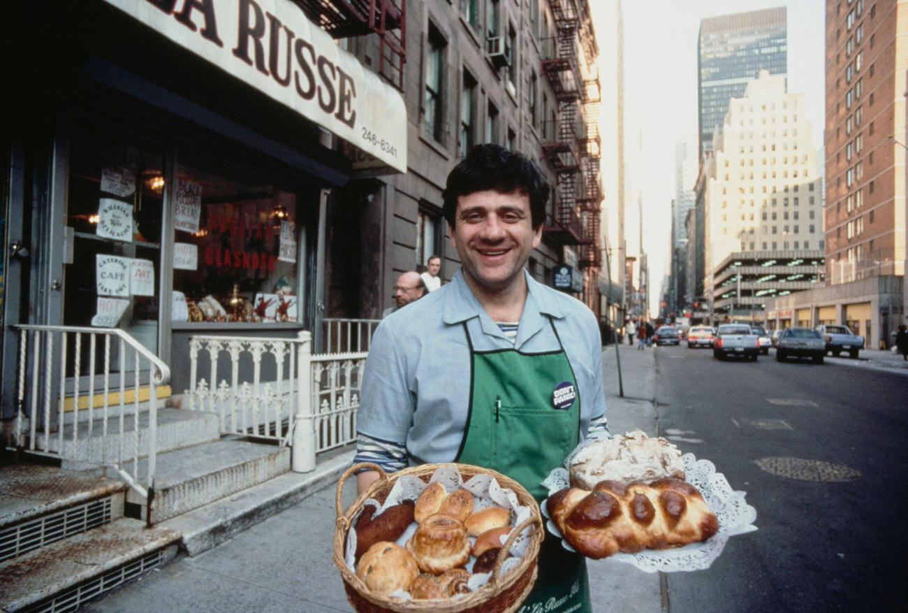 A Baker In Brighton Beach, Brooklyn, Displays Various Types Of Bread, 1990