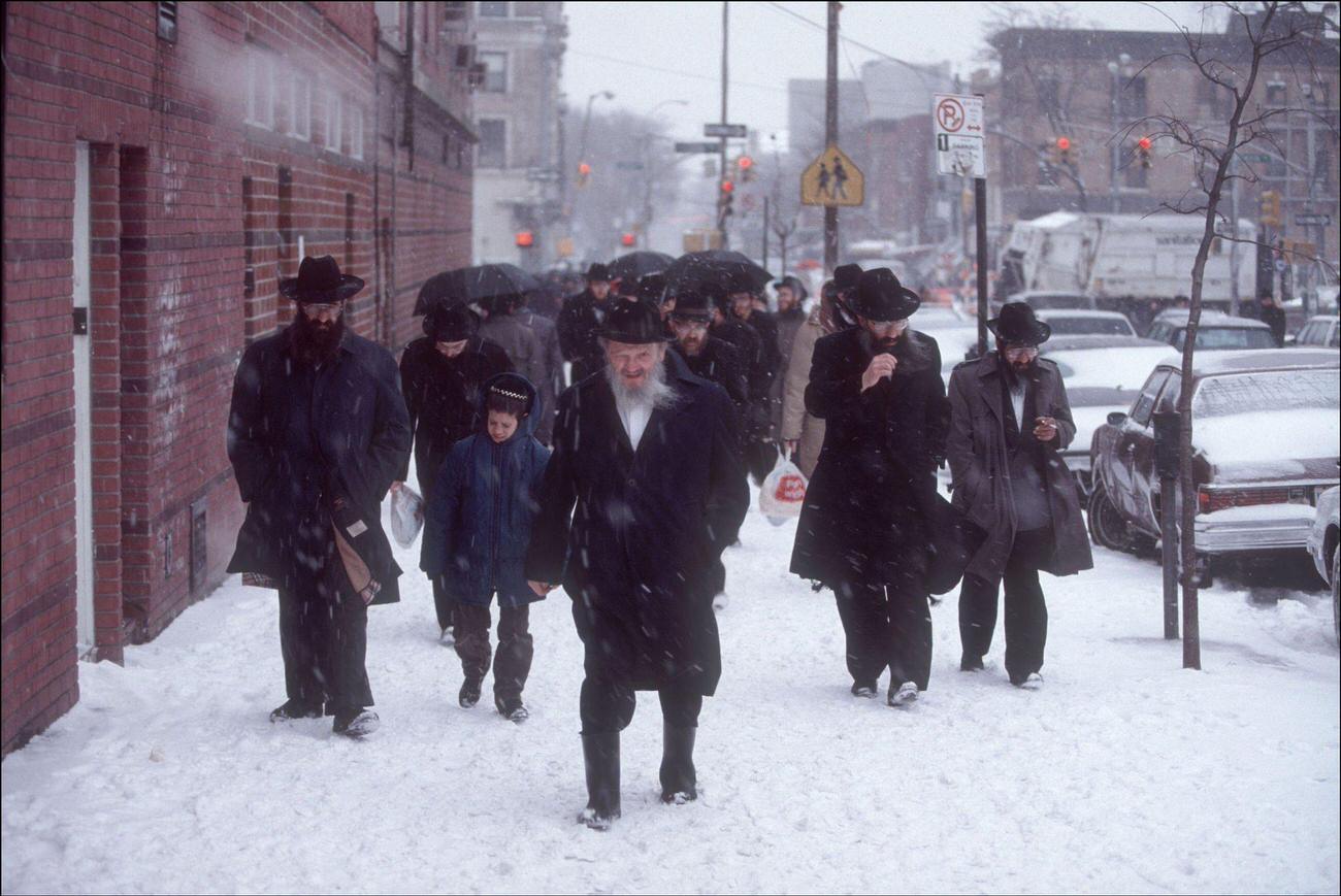 Chassidim Walk Through Snowstorm, Brooklyn, 1990