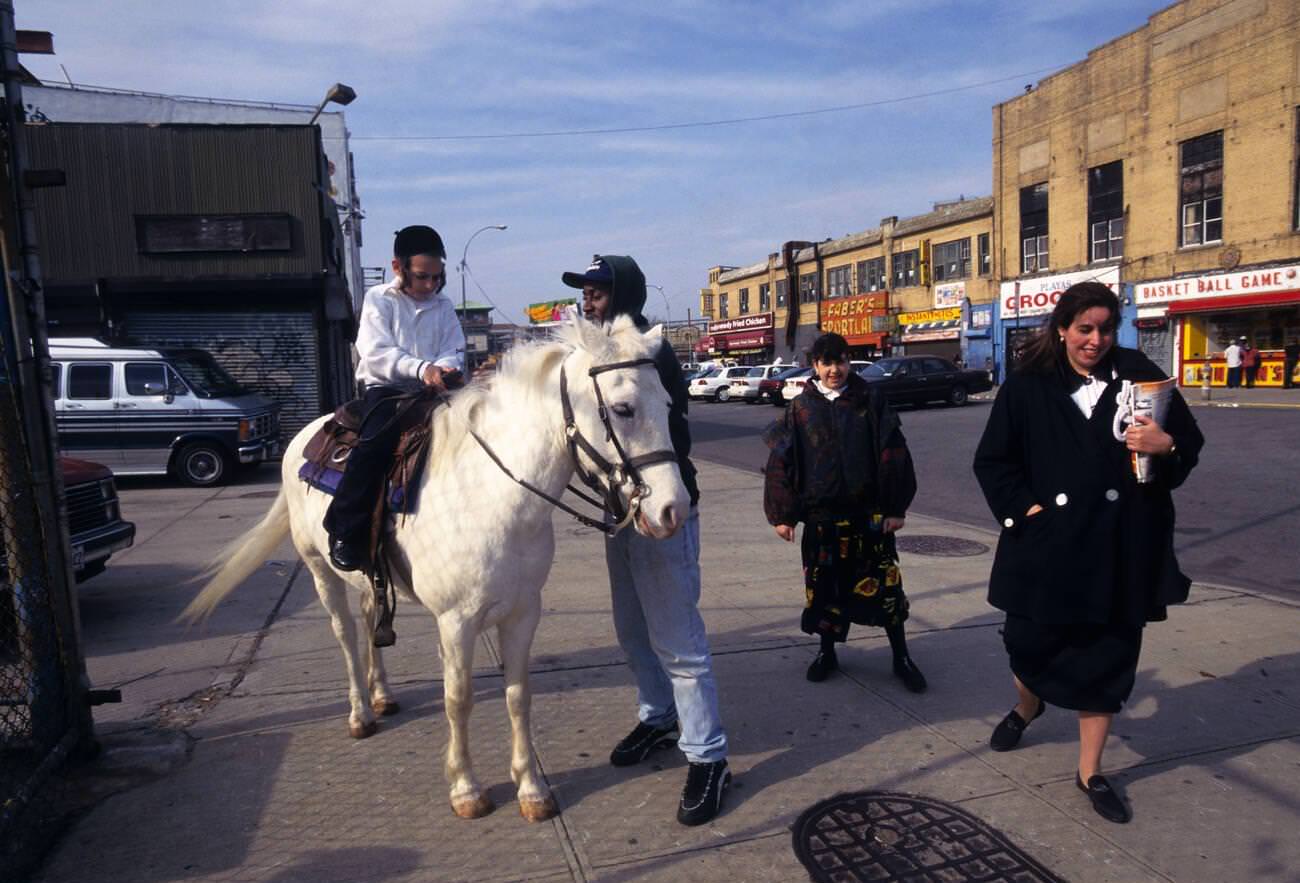 Young Hassidic Boy Goes For Pony Ride, Coney Island, Brooklyn, 1995
