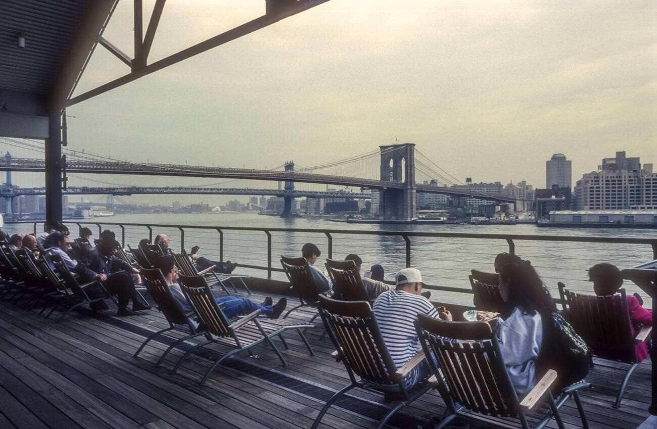 People Enjoy View From South Street Seaport To Brooklyn Bridge, 1994