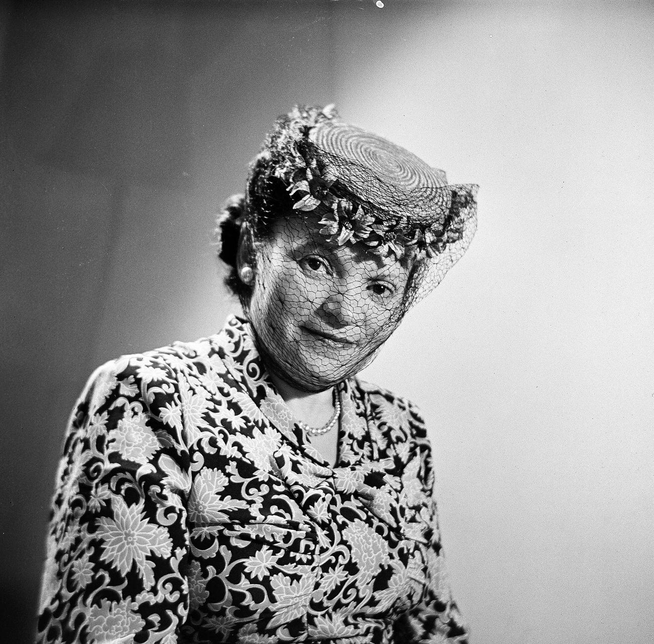 Ida Schlussel Posing In A Veiled Hat, 1945